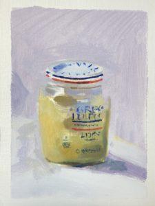 Half filled jar of Grey Poupon mustard.pon 